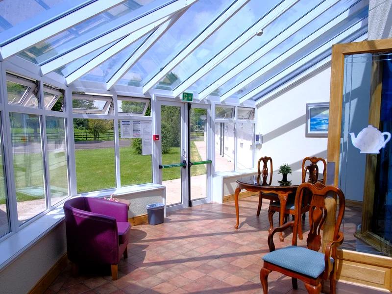 Bright atrium seating area at Rivervale Nursing Home