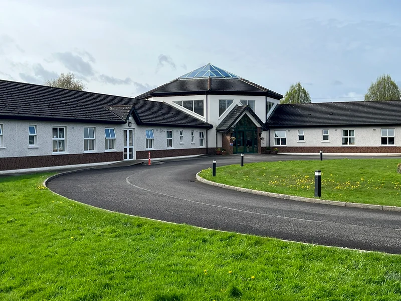 Entrance lawn and front elevation at Rivervale Nursing Home